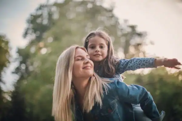 happy mum and daughter following mediation to resolve parental alienation Greater London